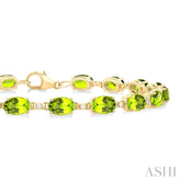 6X4 MM Oval Cut Peridot and 1/6 ctw Round Cut Diamond Semi Precious Tennis Bracelet in 10K Yellow Gold